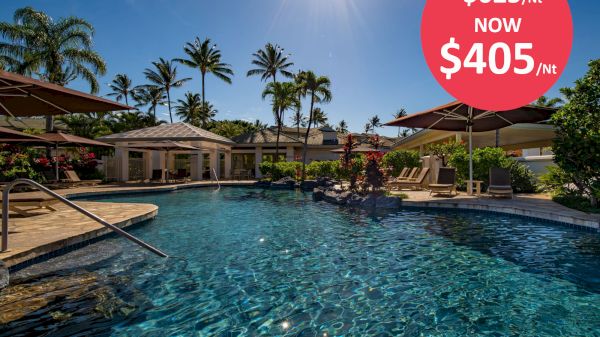 The image shows a luxurious outdoor pool with sun loungers and umbrellas under a sunny sky. A promo text indicates a price drop from $625 to $405 per night.